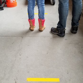 The Home Depot - Keeping a 6 feet distance to wait in line to enter. - Hardware Stores Near Me - Bothell, Washington