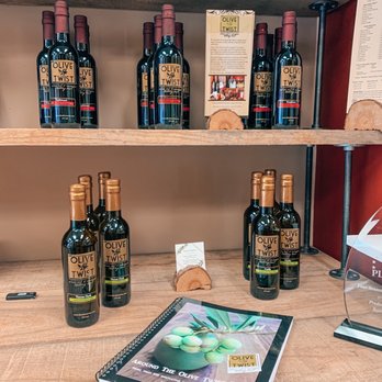 The Olive Twist - Their oils and vinegars on display in our store! - Cooking Classes Near Me - Fort Wayne, Indiana
