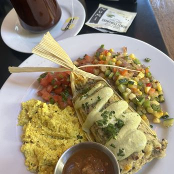 Cup Cafe - Hemp Tamale and scramble breakfast plate with calabacitas. Organic Numi hot tea. - New American Near Me - Tucson, Arizona