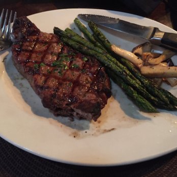 Mabella - Strip Steak with a side of King Tomatoes and Asparagus - Italian Near Me - Columbus, Georgia Mabella - Strip Steak with a side of King Tomatoes and Asparagus - Italian Near Me - Columbus, Georgia