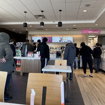 Dunkin' - customers in a dunkin donuts restaurant - Donuts Near Me - Barstow, California Dunkin' - customers in a dunkin donuts restaurant - Donuts Near Me - Barstow, California