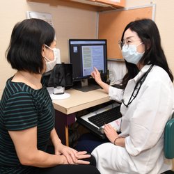 Charles B. Wang Community Health Center - A CBWCHC OB/GYN provider meets with a patient at our 37th Avenue Location in Flushing.
