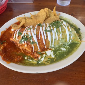 El Chupacabra - "Small" burrito, smothered with half/half (the small is enormous) - Mexican Near Me - Seattle, Washington El Chupacabra - "Small" burrito, smothered with half/half (the small is enormous) - Mexican Near Me - Seattle, Washington