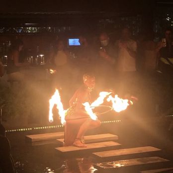 MILA Restaurant - Fire dance performance - Mediterranean Near Me - Miami Beach, Florida MILA Restaurant - Fire dance performance - Mediterranean Near Me - Miami Beach, Florida