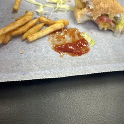 Buku Seafood - Almost through with my shrimp, Poboy and fries.