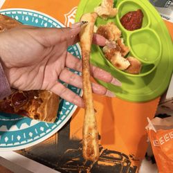 Little Caesar Pizza - Pizza, we already cook replace it. I mean it's like skeleton fingers. Their pathetic breadsticks.