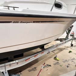 Detailed Motor Works - Re paint, buff, and full cleaning of exterior and deck/cabin