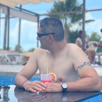 Hotel Riu Dunamar - Chilling at adults only pool bar - Hotels Near Me - Cancun, ROO