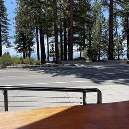 a view of a street and trees