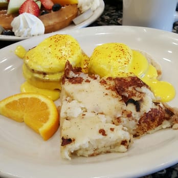 Ball Square Cafe - Classic Eggs Benedict with the grilled potato mash and the Belgian waffle with homemade whipped cream and fruit on top, too! - Breakfast & Brunch Near Me - Somerville, Massachusetts Ball Square Cafe - Classic Eggs Benedict with the grilled potato mash and the Belgian waffle with homemade whipped cream and fruit on top, too! - Breakfast & Brunch Near Me - Somerville, Massachusetts