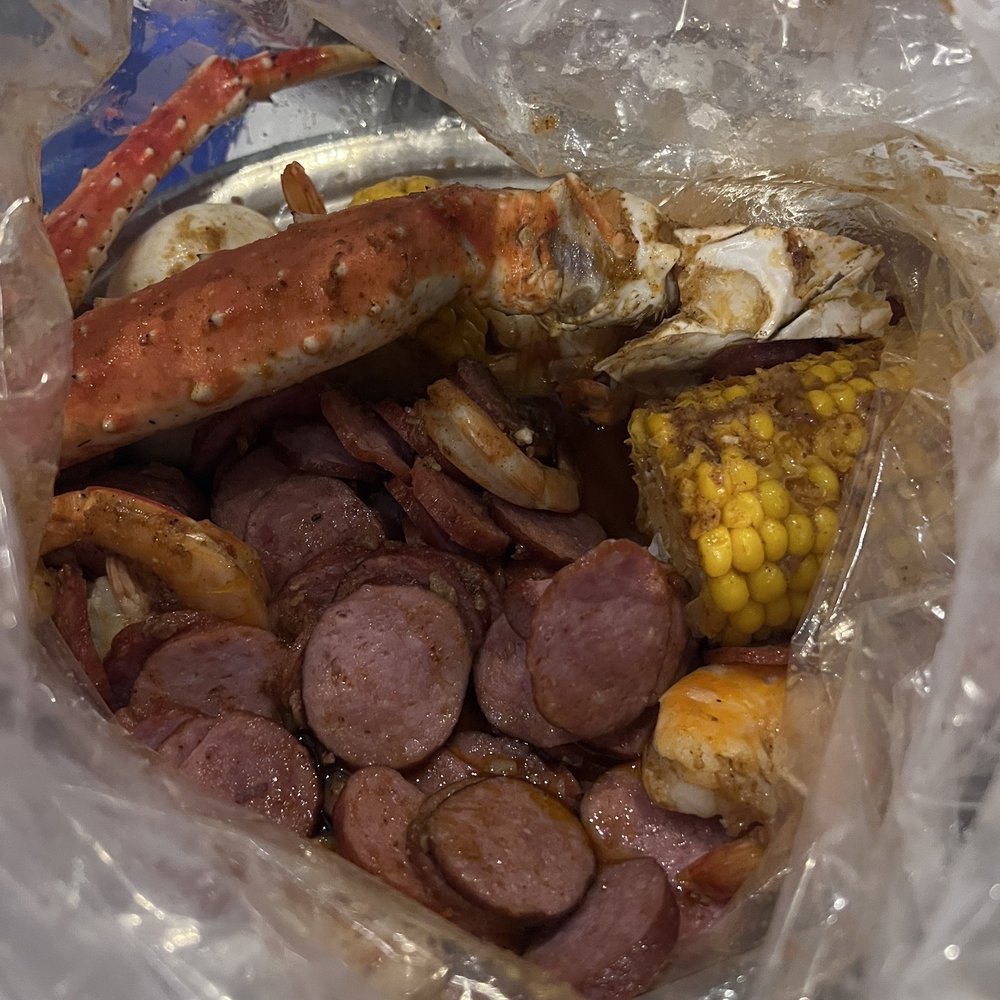 King Crab legs, shrimp no head extra sausage with Cajun hot King Crab legs, shrimp no head extra sausage with Cajun hot