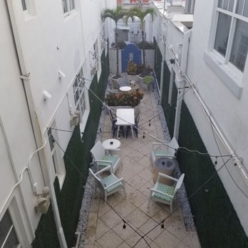 Blue Moon Hotel Autograph Collection - One of the outdoor courtyards - Hotels Near Me - Miami Beach, Florida Blue Moon Hotel Autograph Collection - One of the outdoor courtyards - Hotels Near Me - Miami Beach, Florida