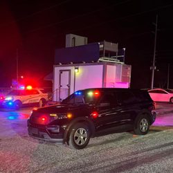 Time Nightclub - A man and an officer got shot and this photo was posted by Marion County outside Time nightclub in their parking area.