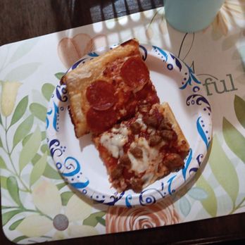 Pizza Hut - A slice of pepperoni and sausage pizza - Chicken Wings Near Me - Des Moines, Iowa