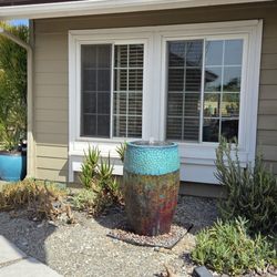 Paradise Fountains - Beautiful pottery fountain in front yard.