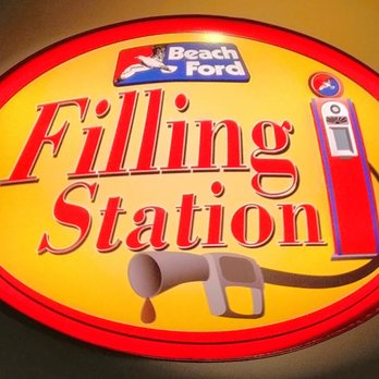 Beach Ford Filling Station - This is a close up of the Filling Station logo and sign. Photo taken July 14, 2018. - Coffee & Tea Near Me - Virginia Beach, Virginia Beach Ford Filling Station - This is a close up of the Filling Station logo and sign. Photo taken July 14, 2018. - Coffee & Tea Near Me - Virginia Beach, Virginia
