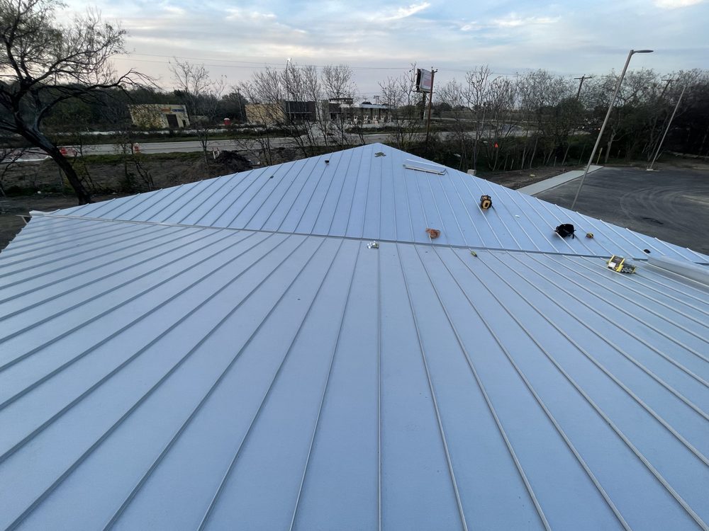 Slide of Top Line Roofing