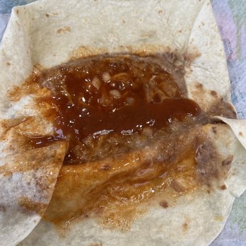Taco Bell - This is what taco bell calls a burrito. This looks more like coming out than going in. - Fast Food Near Me - Port Richey, Florida