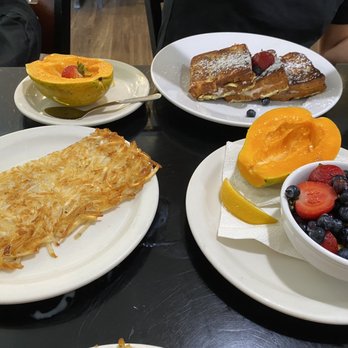 Sweet E's Cafe - Stuffed French toast with a side of papaya. Side of hash browns and fruit bowl (papaya included) - Cafes Near Me - Honolulu, Hawaii Sweet E's Cafe - Stuffed French toast with a side of papaya. Side of hash browns and fruit bowl (papaya included) - Cafes Near Me - Honolulu, Hawaii