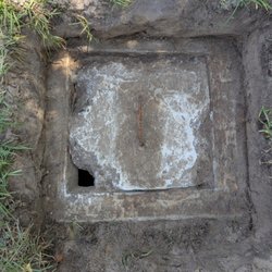 All County Septic - Hole left and covered with loose dirt which poured into the tank.