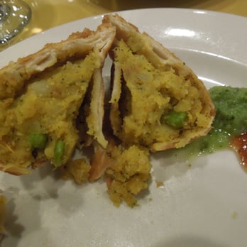 Nirvana Indian Cuisine - Inside of a veggie samosa - Indian Near Me - Arcadia, California Nirvana Indian Cuisine - Inside of a veggie samosa - Indian Near Me - Arcadia, California