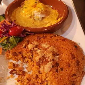 La Cueva del Mar - Fish with coconut sauce and a side - Seafood Near Me - San Juan, Puerto Rico