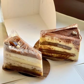 Daan Go Cake Lab - Mont Blanc cake slice (front) & Tiramisu cake slice (back) - Macarons Near Me - Toronto, Ontario Daan Go Cake Lab - Mont Blanc cake slice (front) & Tiramisu cake slice (back) - Macarons Near Me - Toronto, Ontario