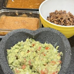 Asada, guacamole, and spicy beans