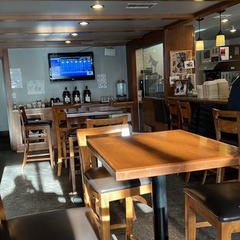 Black Dog Cafe - Comfy seating area complete with mini fireplace! - Cafes Near Me - Canmore, Alberta