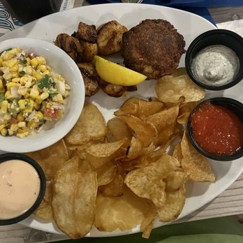 Dockside Waterfront Grill - Crab cake, scallops, corn salad and chips - Seafood Near Me - Venice, Florida Dockside Waterfront Grill - Crab cake, scallops, corn salad and chips - Seafood Near Me - Venice, Florida