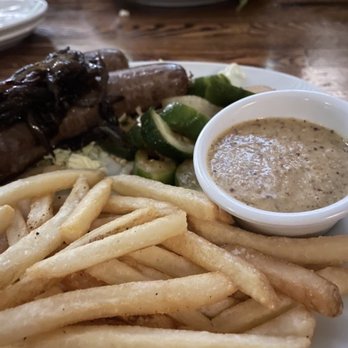 The Bistro - Brats with cucumber kimchi and fries, and burger with fries - Seafood Near Me - Kilauea, Hawaii The Bistro - Brats with cucumber kimchi and fries, and burger with fries - Seafood Near Me - Kilauea, Hawaii