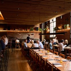 Rolf and Daughters - Cozy and rustic interior of Rolf and Daughters restaurant