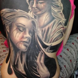 Skinny Bone Tattoos & Piercings