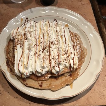 Love Cafe - Short stack of pancakes (2) with the works: powdered sugar, whipped cream, chocolate syrup, caramel syrup, and cocoa powder - Coffee & Tea Near Me - New York, New York Love Cafe - Short stack of pancakes (2) with the works: powdered sugar, whipped cream, chocolate syrup, caramel syrup, and cocoa powder - Coffee & Tea Near Me - New York, New York