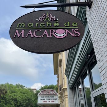 Marche de Macarons - a sign on the side of a building - Macarons Near Me - Savannah, Georgia