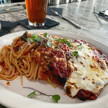 Encore Ristorante - Eggplant parmigiana with spaghetti. - Italian Near Me - Raleigh, North Carolina