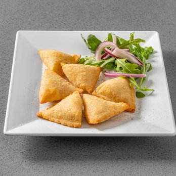 Red Onion - Crispy turnovers with jalapeno cheese. - Vegetarian Near Me - New York, New York Red Onion - Crispy turnovers with jalapeno cheese. - Vegetarian Near Me - New York, New York
