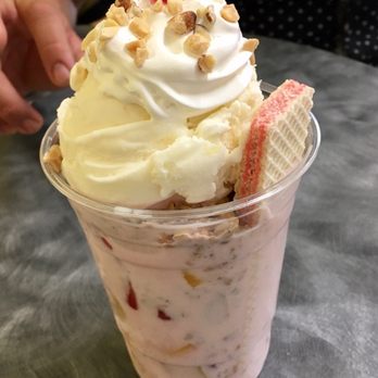 Mangos Juice Bar - Mixed fruit salad topped w granola and piña colada ice cream and finished of with whip cream and a cherry on top ! - Juice Bars & Smoothies Near Me - Cathedral City, California