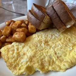 Scotty's Restaurant - Cheese omelette with hash browns and sourdough