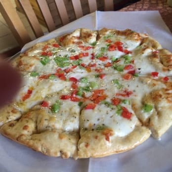Pi-Hi Cafe - Pepper jack white pizza: gooey cheese, buttered/garlic crust cooked to perfection in a wood burning oven! - Mediterranean Near Me - Chicago, Illinois