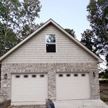 Daniels Construction - a two car garage with a fire hydrant in front of it - General Contractors Near Me - Tullahoma, Tennessee