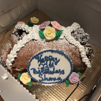 Sicilian Bakery - Ahhhh, just opening the box to this deliciousness!  36 cannolis inside of a large Cannoli shell. - Bakeries Near Me - Chicago, Illinois