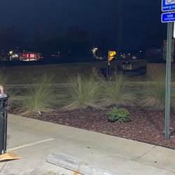 Tidal Wave Auto Spa - Macon - Trash on the ground from overloaded trash cans