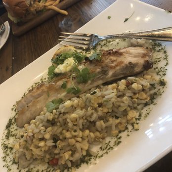 Blackwall Hitch - The grilled rockfish, with garlic butter. Really good. Nice and light. - New American Near Me - Baltimore, Maryland
