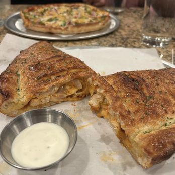 Sip N Spices - Butter chicken calzone - Indian Near Me - Morrisville, North Carolina