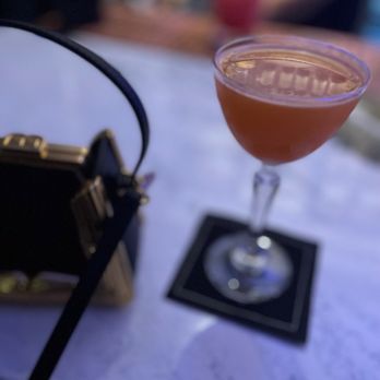 Smoke & Mirrors - a drink in a glass on a table - Bars Near Me - Washington Dc, District of Columbia Smoke & Mirrors - a drink in a glass on a table - Bars Near Me - Washington Dc, District of Columbia