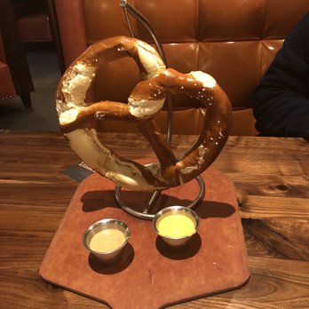 Maggie McFly's | Springfield - Giant soft pretzel with cheese and tangy bbq mustard! Yummy - American Near Me - Springfield, Virginia Maggie McFly's | Springfield - Giant soft pretzel with cheese and tangy bbq mustard! Yummy - American Near Me - Springfield, Virginia