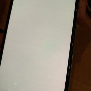 One Hour Device Repair - Redmond - This is a white background on my iPhone after a "repair" here. You can see the dark lines and burning on the screen they gave me. - Electronics Repair Near Me - Redmond, Washington