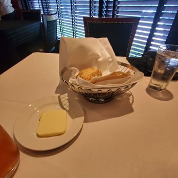 The Capital Grille - Bread basket with butter - Steakhouses Near Me - Plano, Texas The Capital Grille - Bread basket with butter - Steakhouses Near Me - Plano, Texas
