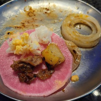 Iron Age Glenview - Used the turnip to wrap some meat and rice, sauce and pineapple - Barbeque Near Me - Glenview, Illinois Iron Age Glenview - Used the turnip to wrap some meat and rice, sauce and pineapple - Barbeque Near Me - Glenview, Illinois